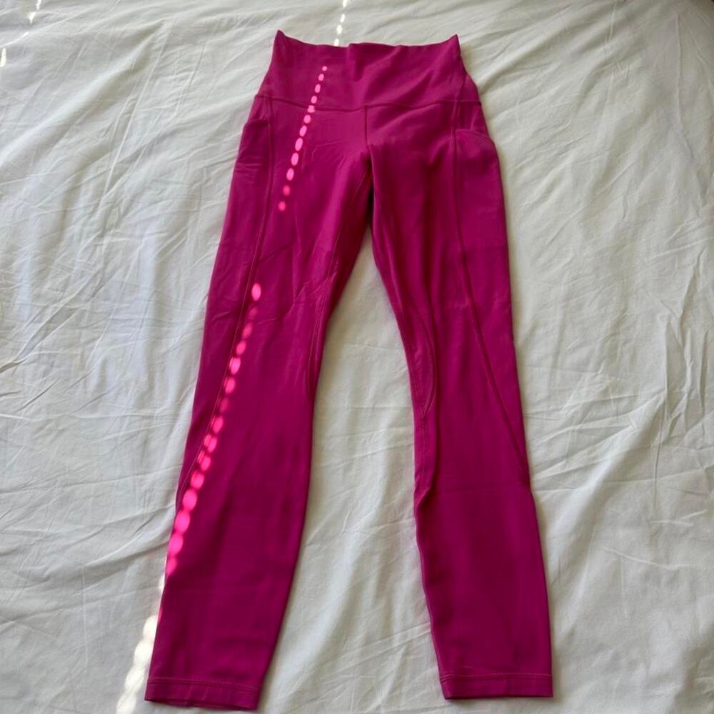 Pink high waisted leggings with pockets
